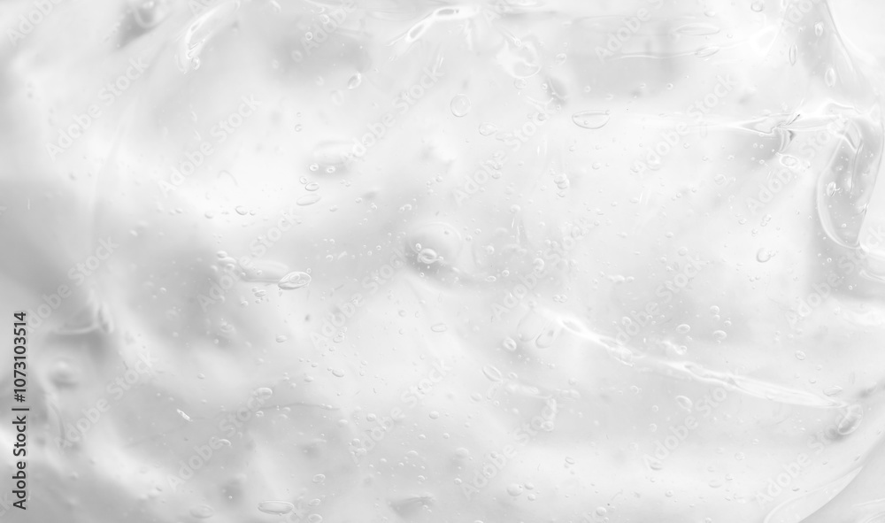 Obraz premium Cosmetic gel, serum transparent sample. Liquid cream with bubble texture. Gel texture of a cosmetic product. Clear liquid lotion for skin care.