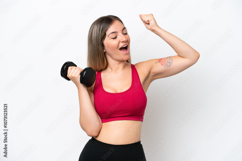 Young sport Rumanian woman making weightlifting isolated on white background celebrating a victory Young sport Rumanian woman making weightlifting isolated on white background celebrating a victory