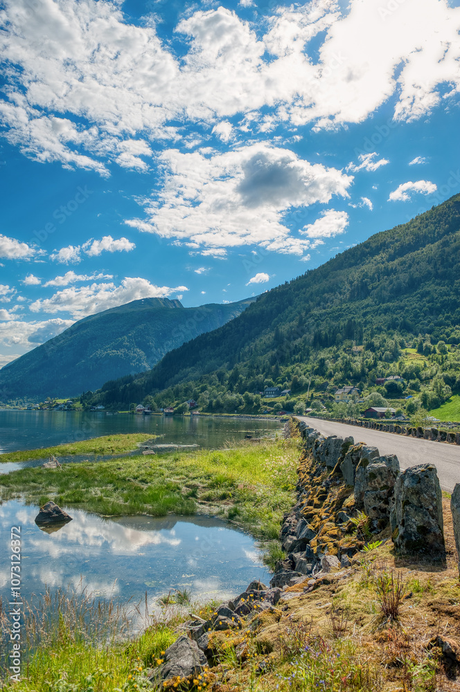 Fjærlandsfjorden is a fjord in Vestland county, Norway. It is an arm of the fjord that branches off from the main Sognefjorden to the north, passing through the municipality of Sogndal. Fjærlandsfjorden is a fjord in Vestland county, Norway. It is an arm of the fjord that branches off from the main Sognefjorden to the north, passing through the municipality of Sogndal.