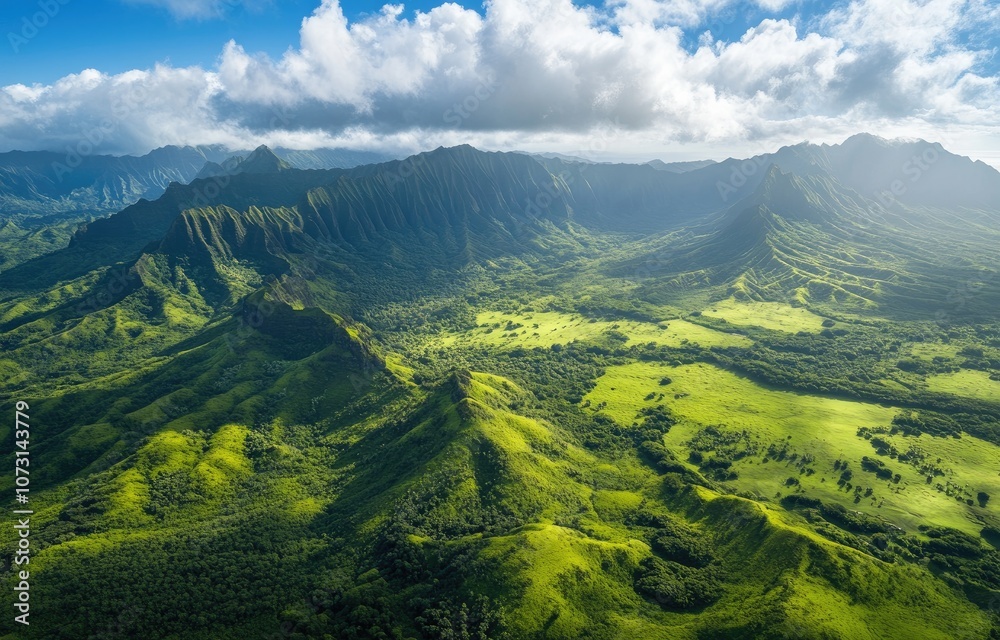 A stunning aerial view of the lush green mountains under a blue sky, with rays of sunlight piercing through the clouds above, creating an enchanting and serene landscape. A stunning aerial view of the lush green mountains under a blue sky, with rays of sunlight piercing through the clouds above, creating an enchanting and serene landscape.