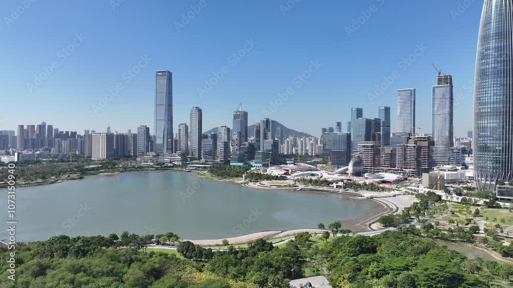 Skyview the coastal ecological landscape of China Greater Bay Area Shenzhen near Hong Kong with city rapid growth technological innovation and diverse culture showcasing a financial manufacturing hub. Skyview the coastal ecological landscape of China Greater Bay Area Shenzhen near Hong Kong with city rapid growth technological innovation and diverse culture showcasing a financial manufacturing hub.