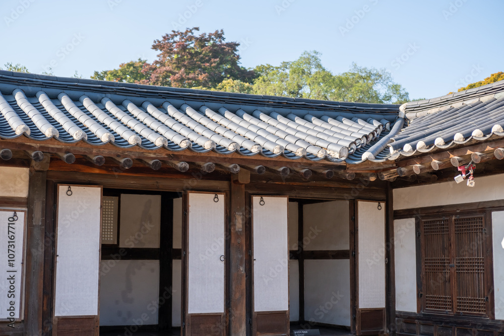 Korean traditional building in Changdeokgung palace. It is one of the Five Grand Palaces built by the kings of the Joseon dynasty. with beautiful autumn foliage. Korean traditional building in Changdeokgung palace. It is one of the Five Grand Palaces built by the kings of the Joseon dynasty. with beautiful autumn foliage.
