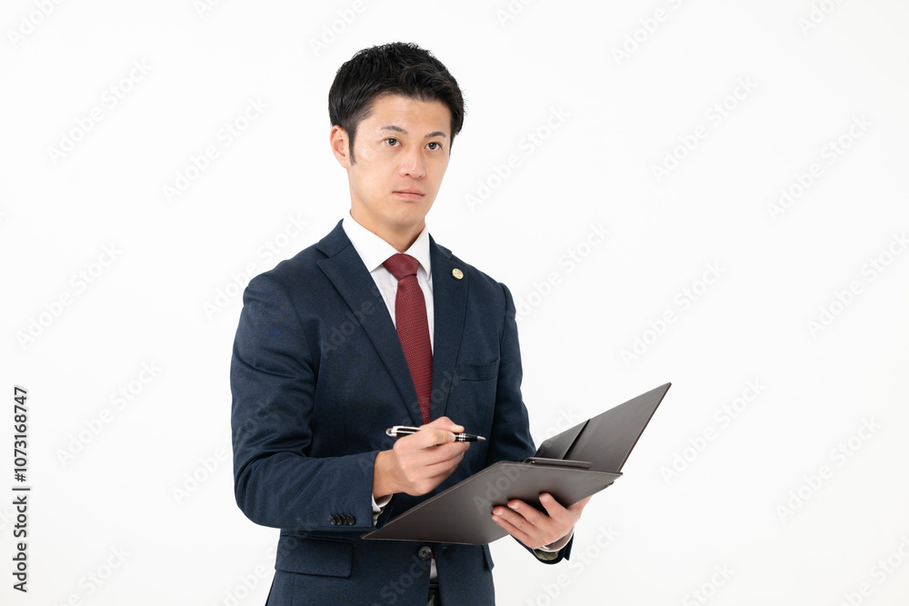 ファイルを持つ男性弁護士