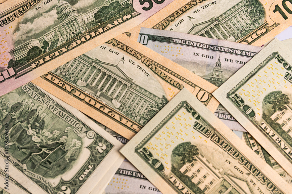Cash of dollar note, dollar background. Lot of one hundred dollar bills close-up. dollars in wallet on white background Cash of dollar note, dollar background. Lot of one hundred dollar bills close-up. dollars in wallet on white background