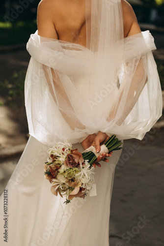 wedding bouquet in the hands of a bride