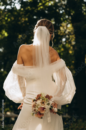 bride and groom in the park