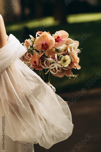 bride holding bouquet of flowers