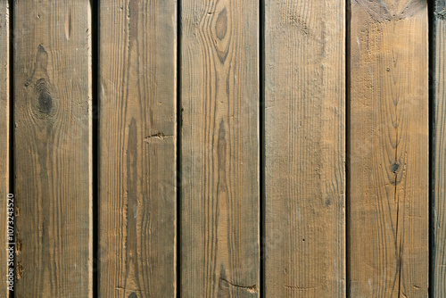 Obraz na płótnie The old wooden plank is weathered, cracked, and rough. w salonie