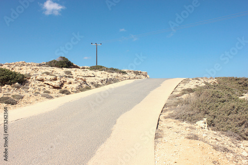 Asphalt road neat the Capo Greco, Cyprus.