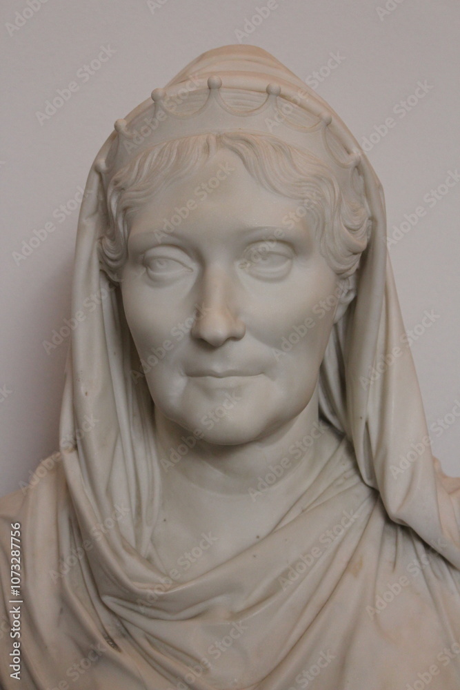 white marble bust of a woman