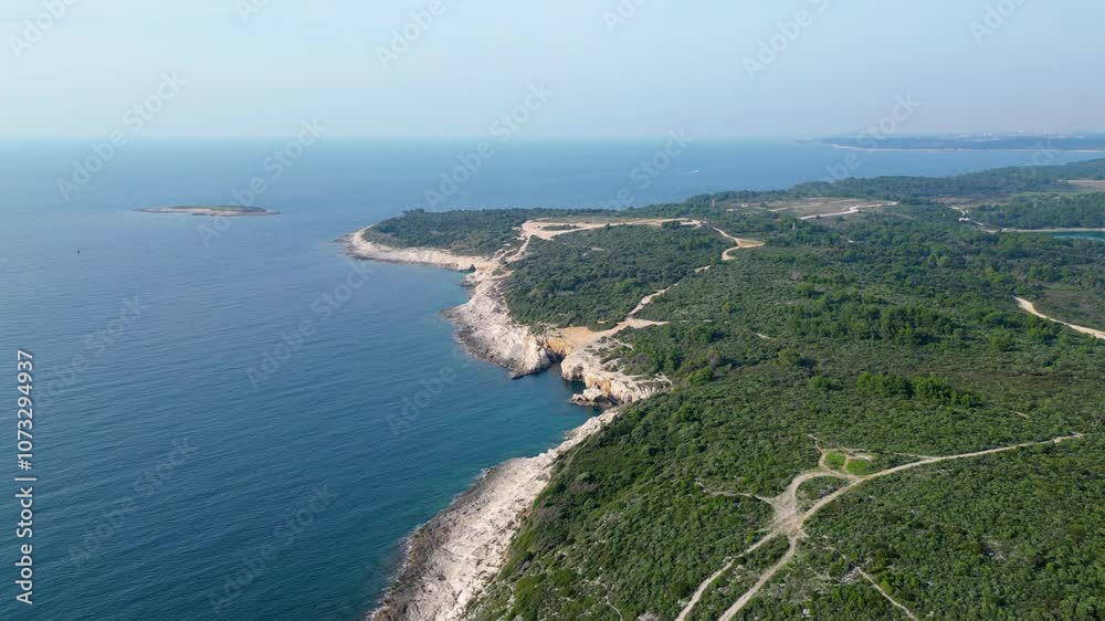 Rt Kamenjak is a stunning peninsula located near Pula, Croatia. Renowned for its rugged coastline, crystal-clear waters, and numerous small islands, it offers breathtaking aerial views Rt Kamenjak is a stunning peninsula located near Pula, Croatia. Renowned for its rugged coastline, crystal-clear waters, and numerous small islands, it offers breathtaking aerial views