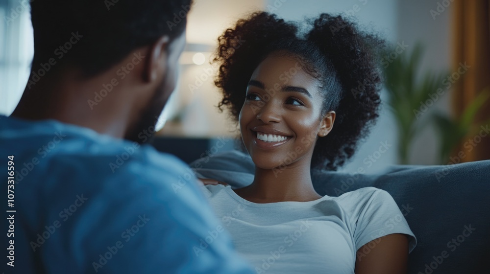 Couple's Joyful Moment Shared on Sofa Couple's Joyful Moment Shared on Sofa