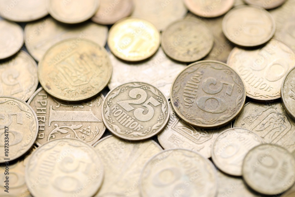 Big pile of different coins from various time period in Ukraine. Shiny Ukrainian money background Big pile of different coins from various time period in Ukraine. Shiny Ukrainian money background