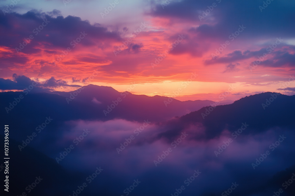 Fototapeta premium Majestic Sunset Over Misty Mountains