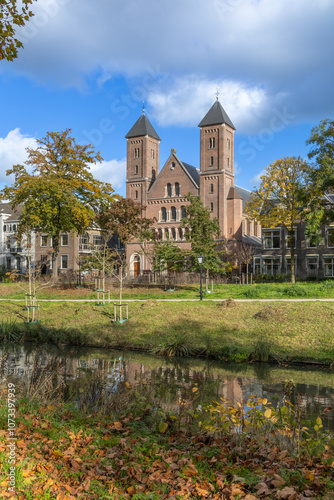 Old Catholic Gertrude's Cathedral along the Stadsbuitengracht. The Stadsbuitengracht is the canal around the old city center of the Dutch city of Utrecht.