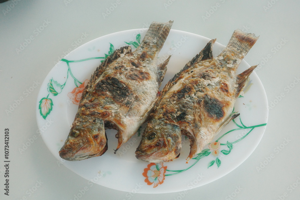 Grill Tilapia Fish Fresh from Lake Sebu, South Cotabato, Philippines. Grill Tilapia Fish Fresh from Lake Sebu, South Cotabato, Philippines.