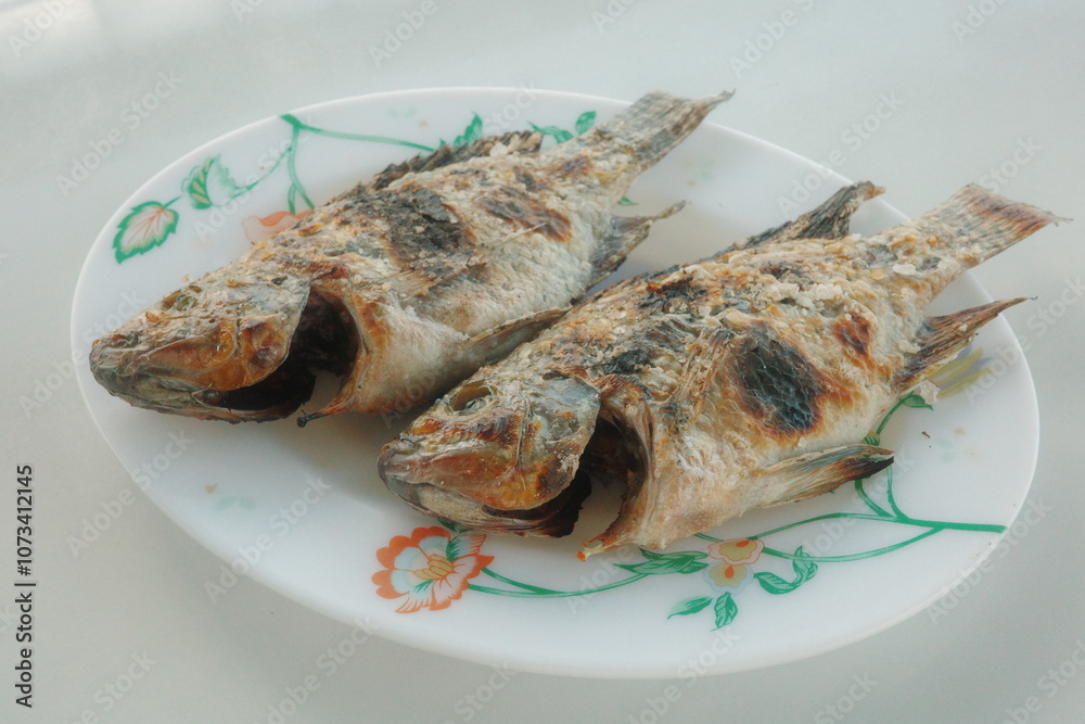 Grill Tilapia Fish Fresh from Lake Sebu, South Cotabato, Philippines. Grill Tilapia Fish Fresh from Lake Sebu, South Cotabato, Philippines.