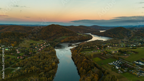 Fototapeta Naklejka Na Ścianę i Meble -  Aerial View of Solina Lake and Vibrant Autumn Colors in Bieszczad