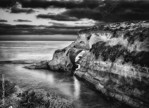 Munxar natural window in cliffs - Black and white photo