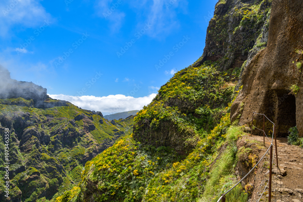 Vereda do Areeiro walking trail between Pico Areeiro and Pico Ruivo peaks on Madeira Vereda do Areeiro walking trail between Pico Areeiro and Pico Ruivo peaks on Madeira