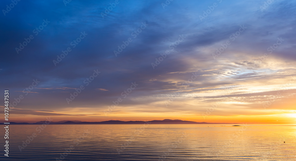 Serene Sunrise Over Vancouver Island Waters in Victoria, BC, Canada Serene Sunrise Over Vancouver Island Waters in Victoria, BC, Canada