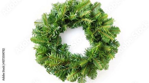 Christmas Wreath Isolated on White Background - a festive and charming visual. The Christmas wreath isolated on the white background creates a simple yet elegant look. It gives the impression of a hol