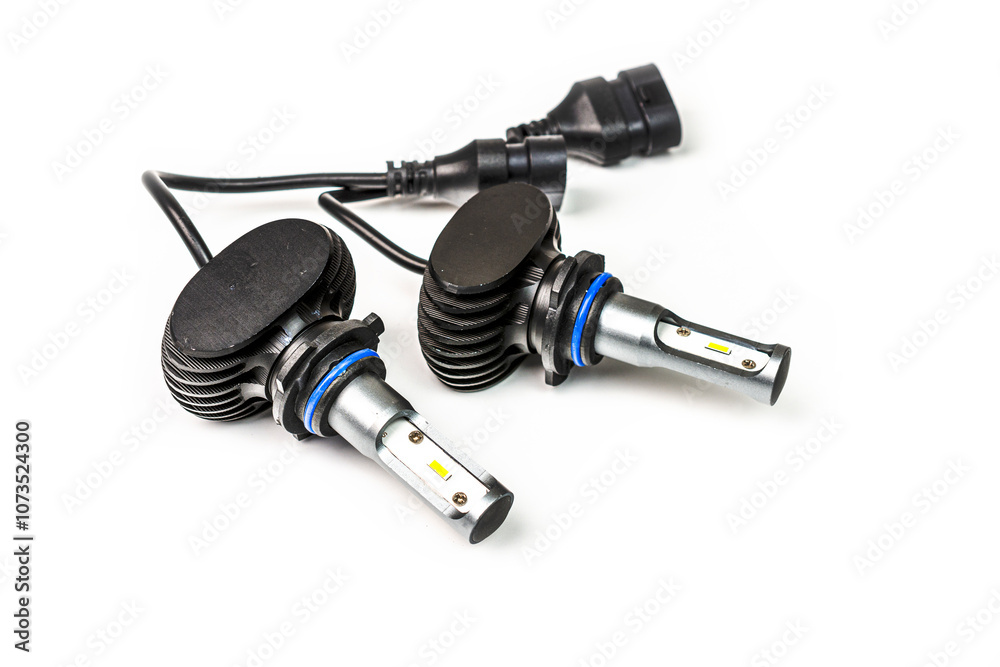 Light bulbs for car lamps. Automotive part in Silvery metallic and black color with wires and connecting elements Light bulbs for car lamps. Automotive part in Silvery metallic and black color with wires and connecting elements