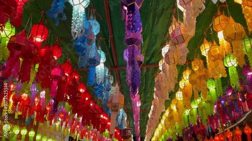 Multi colourful paper lantern light lamps decoration hanging on ceiling in the Yee Peng Festival in Chiang Mai, Northern Thailand
