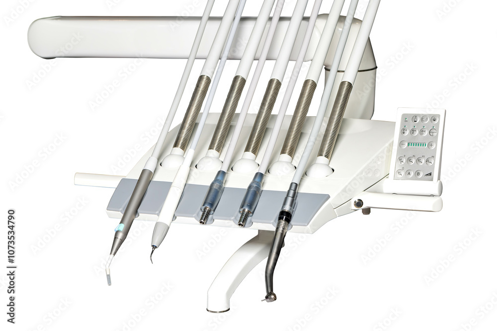 Modern dental equipment ready for a procedure in a bright, well-lit clinic environment, isolated on white background.