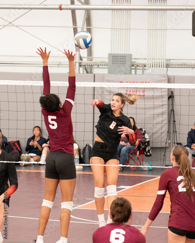 College volleyball player wearing lower back support belt