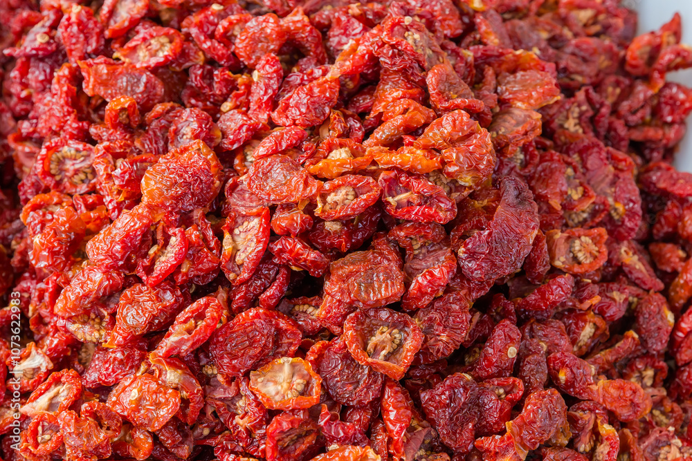 Heap of sundried red cherry tomatoes, top view close-up Heap of sundried red cherry tomatoes, top view close-up