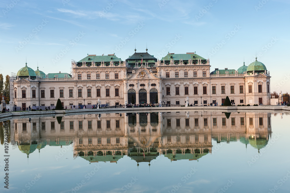 Palace Upper Belvedere reflected in pond on foreground in Vienna Palace Upper Belvedere reflected in pond on foreground in Vienna