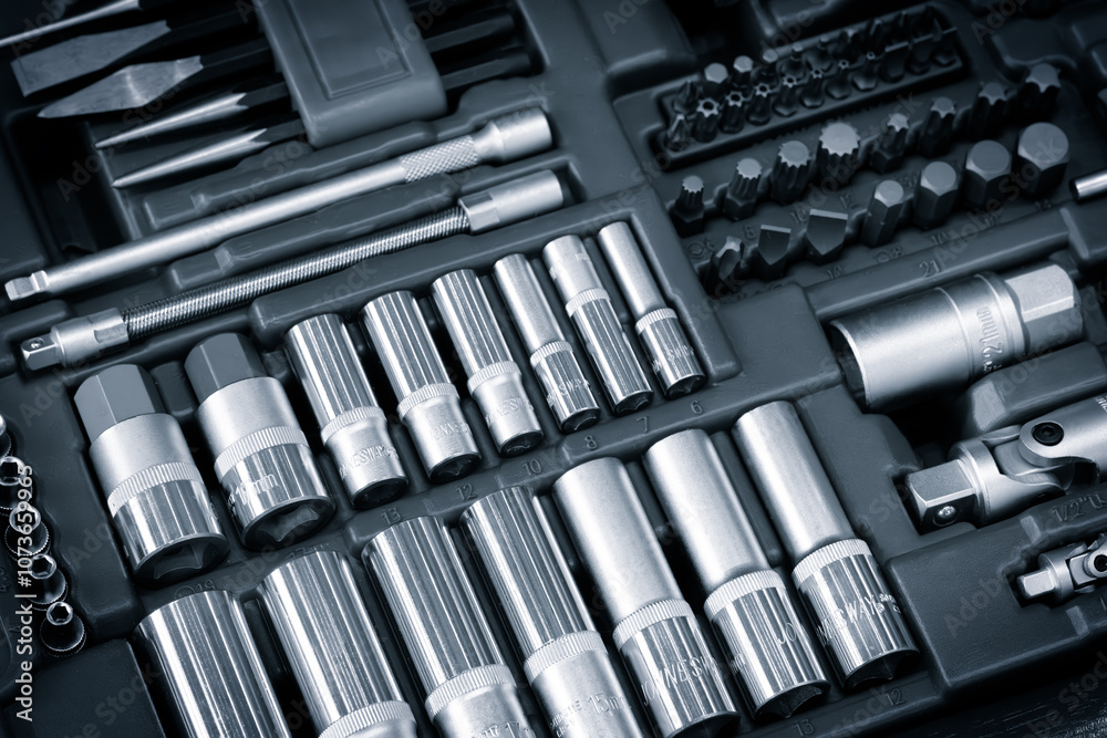 A collection of tools including wrenches, pliers, and screwdrivers. Concept of organization and preparedness A collection of tools including wrenches, pliers, and screwdrivers. Concept of organization and preparedness