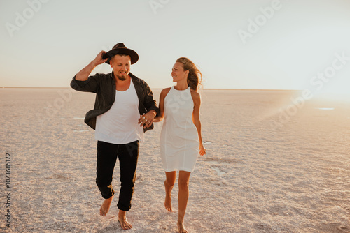 pink Lemurian lake, romantic photoshoot of young couple in love photo