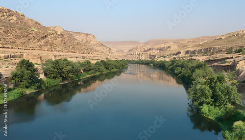 Serene Tigris River Shores with Lush Reflections