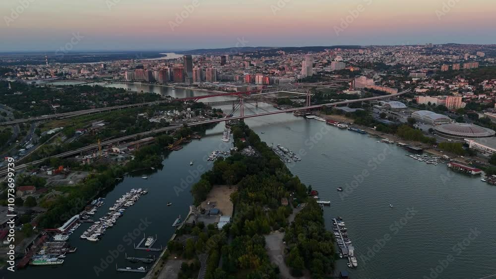 Sunset in the city from a bird's eye view with a view of the bridge Sunset in the city from a bird's eye view with a view of the bridge