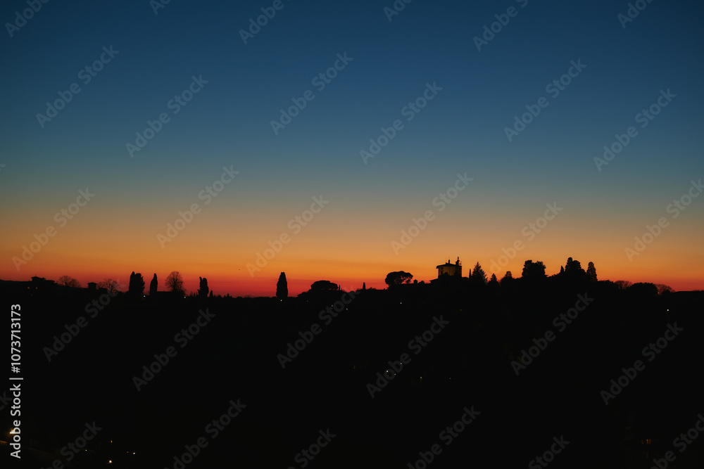 Hills wwith trees silhouette at dusk, after sunset Hills wwith trees silhouette at dusk, after sunset