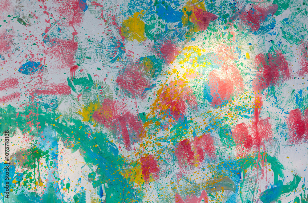 A colorful painting with splatters of paint on it A colorful painting with splatters of paint on it