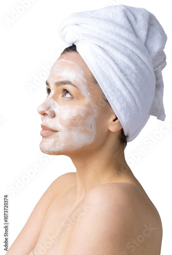 Beauty portrait of woman in white towel on head applies cream to the face. Skincare cleansing eco organic cosmetic spa relax concept. photo