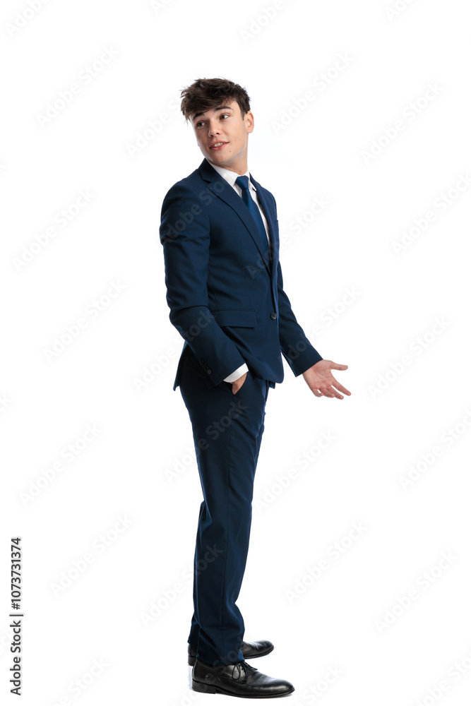 elegant young business student standing with hand in pocket elegant young business student standing with hand in pocket