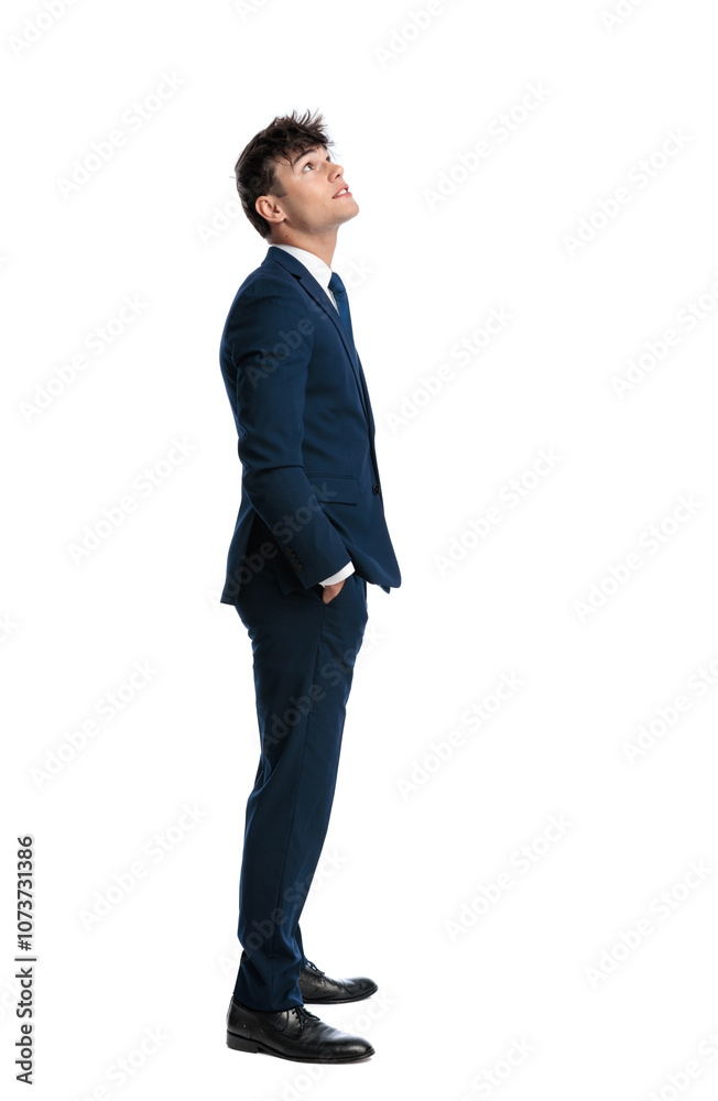 side view of sexy young businessman standing with hands in pockets side view of sexy young businessman standing with hands in pockets