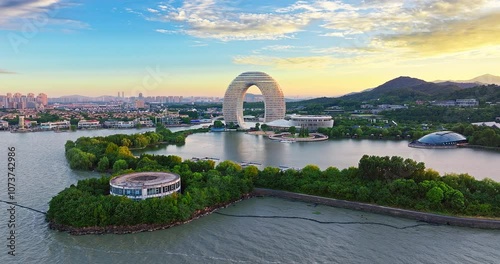 Modern city buildings skyline travel destination by the lake at sunrise in Huzhou, China