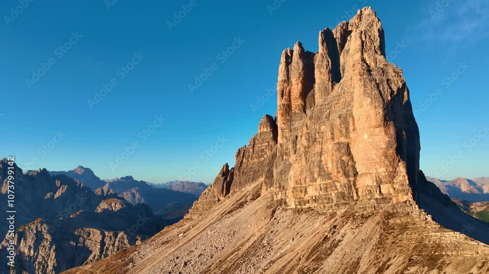 Tre Cime di Lavaredo in Italian Dolomites, aerial view of Tre Cime, famous mountain peak in the European Alps at sunrise Tre Cime di Lavaredo in Italian Dolomites, aerial view of Tre Cime, famous mountain peak in the European Alps at sunrise