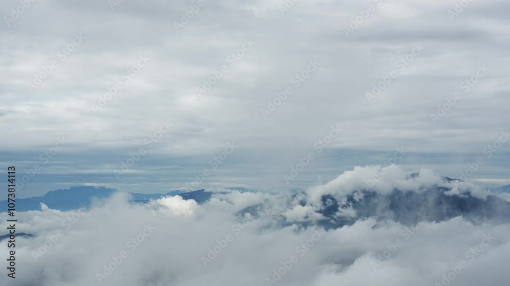 4k Aerial Shot of Big Mountain Sea of Clouds Tumbling Blue Sky Time-lapse 4k Aerial Shot of Big Mountain Sea of Clouds Tumbling Blue Sky Time-lapse