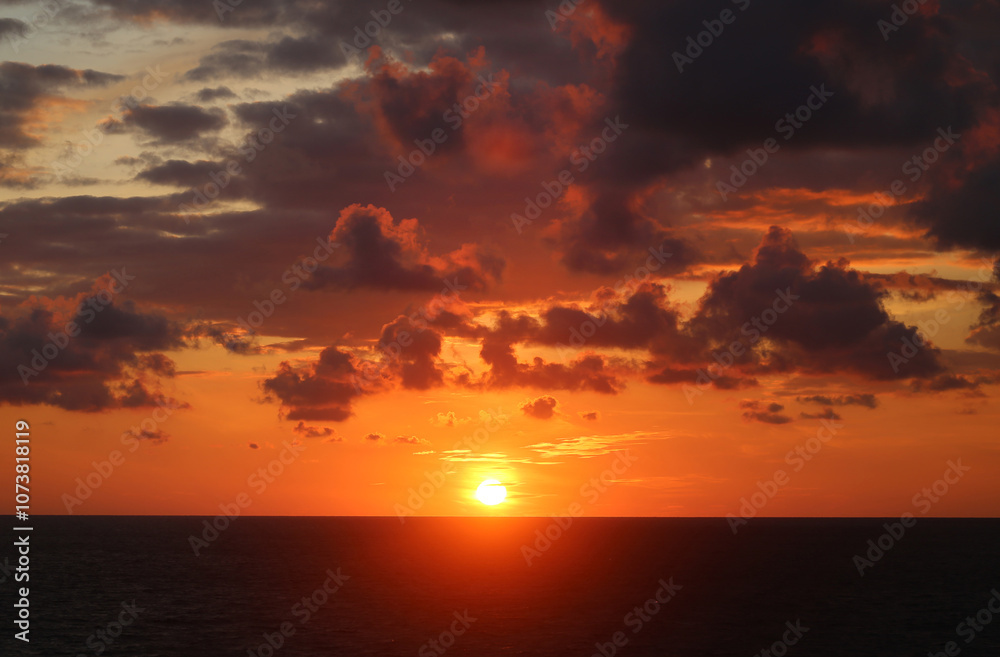 Fototapeta premium Photos of an unusual autumn sunset at sea