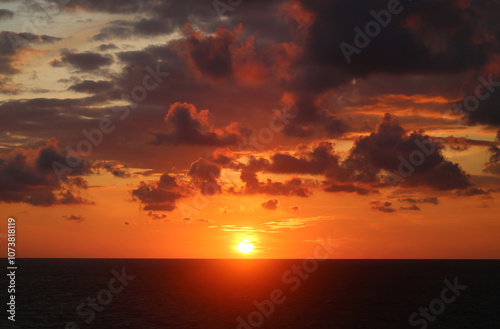 Photos of an unusual autumn sunset at sea