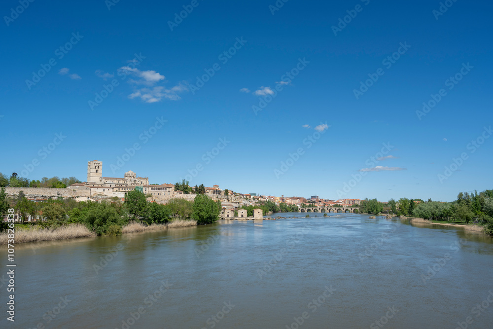 Zamora, Spain - April 17, 2024: Panoramic view of the city and the Duero River with the Stone Bridge Zamora, Spain - April 17, 2024: Panoramic view of the city and the Duero River with the Stone Bridge