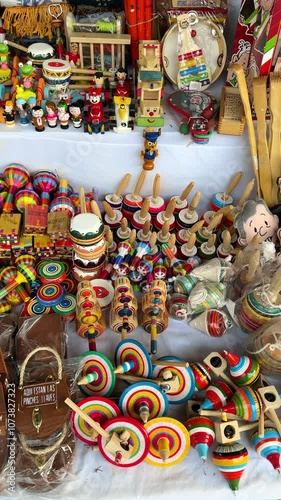 Stock of traditional Mexican toys, crafts and souvenirs displayed for sale