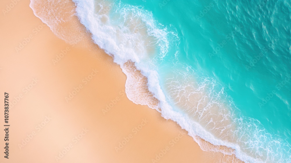 Fototapeta premium Waves gently caress a pristine sandy beach under a clear blue sky, AI
