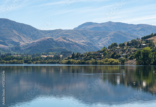 Gorgeous views of lake hayes in New zealand clear day hills